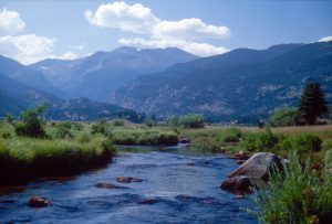 A stream emerges from the mountains in Colorado's Rocky Mountain National Park.